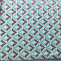 Tessuto jacquard geometrico satinato blu